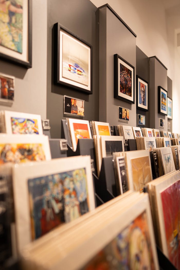 Vertical shot of an art gallery showcasing framed prints and artwork in İstanbul.